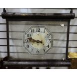 Hanging clock with Arabic numerals to the glass dial