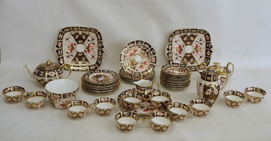 Royal Crown Derby Imari pattern teaset, no.2451, viz:- 12 cups and saucers, 12 tea plates plus 2