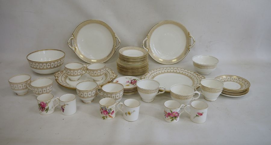 Set of six Royal Worcester coffee cans and saucers, floral spray decorated, a quantity of white