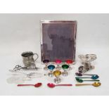 Silver-coloured metal rectangular picture frame, a collection of metal eggcups with coloured