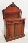 Early 20th century walnut sideboard, the carved back with single narrow shelf, on turned front