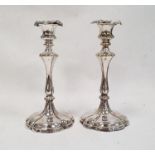 Pair of 20th century silver plated mounted candlesticks, rounded hexagonal design, marked 'E&Co'