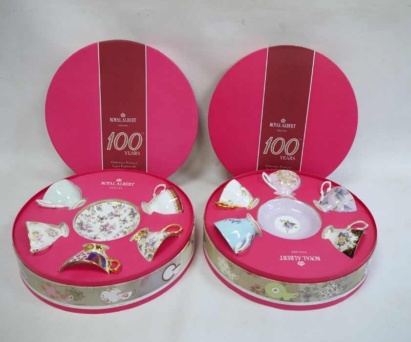 Two sets of Royal Albert china '100 Years Commemorative' decorative teacups and saucers (2 boxes