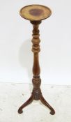19th century mahogany turned and carved aspidistra stand on ogee supports, 122cm high