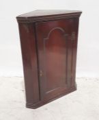 19th century oak wall-hanging corner cupboard with panelled door, 87cm high