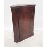 19th century oak wall-hanging corner cupboard with panelled door, 87cm high