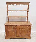 20th century pine sideboard, the rectangular top above two drawers, two cupboard doors, on bracket