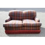 Modern two-seat sofa in tartan upholstery, the whole in the manner of Howard & Sons of London,