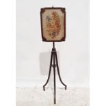 Mahogany framed needlework polescreen with needlework floral spray, reeded supports