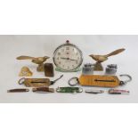 Sundry souvenir teaspoons, 1950s Smiths green metal alarm clock and sundry collectables (2 boxes)