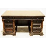 Late 19th century desk, the rectangular top with draw leaves to the sides, nine drawers with