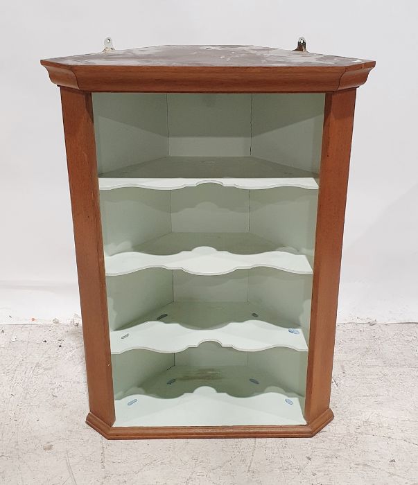 20th century oak wall-hanging corner shelf unit with moulded cornice above four shelves