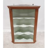 20th century oak wall-hanging corner shelf unit with moulded cornice above four shelves
