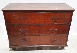 Early 19th century oak chest of three long drawers, the rectangular top with satinwood inlay above