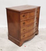 20th century walnut serpentine-fronted chest of four long drawers, on bracket feet, 66cm x 83cm