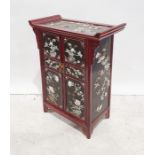 LOT WITHDRAWN Lacquer decorated 20th century Chinese style cupboard, two doors enclosing shelves and