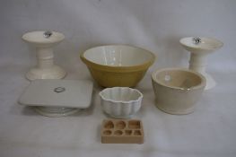 Two G Rushbrooke pottery ham stands, a stoneware mortar with glass pestle, a William Douglas &