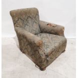 19th century armchair in green foliate upholstery, on turned front feet