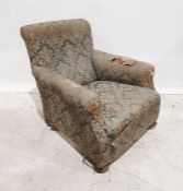 19th century armchair in green foliate upholstery, on turned front feet