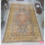 Eastern silk rug, blue ground field decorated with various animals and flowers, red ground central