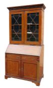 George III satinwood bureau bookcase having ovolo cornice, dentil frieze, pair astragal glazed doors