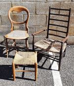 Low ladderback armchair with rush seat, cane seated chair and a stool (3)