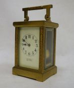 Late 19th century glass and brass carriage clock with Arabic numerals to the dial, marked '