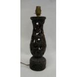 Eastern carved and pierced hardwood table lamp with figure of a dancer accompanied by a fawn, 29cm