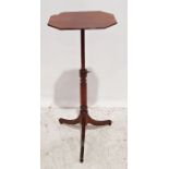 19th century mahogany height adjustable side table on turned column to three fluted legs