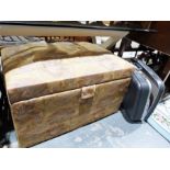 Vintage upholstered ottoman and suitcase and contents of assorted textiles (2)