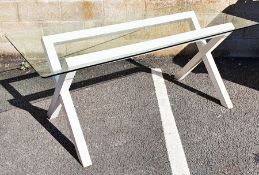 Modern glass-topped dining table, rectangular with white painted X-shaped base, 175cm x 82cm