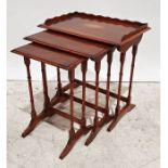20th century mahogany and inlaid nest of three tables, the largest table with three-quarter
