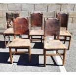 Set of four plus two further oak framed leather seated and backed chairs with moulded front legs (6)