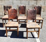 Set of four plus two further oak framed leather seated and backed chairs with moulded front legs (6)