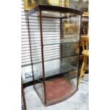 Shop display cabinet, the mahogany frame with bow glass front, glass sides and glass shelves, 68cm x