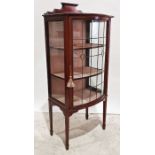 Early 20th century mahogany and boxwood strung bowfront display cabinet with leaded glazed doors
