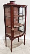 Early 20th century mahogany and boxwood strung bowfront display cabinet with leaded glazed doors