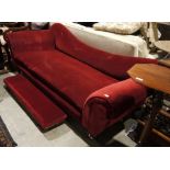 19th century chaise longue / sofa in red upholstery, on turned front legs to brass castors with