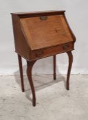 Early 20th century Arts & Crafts-style oak student's bureau, the fall with pigeonhole interior above