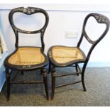 Pair of early 20th century mother-of-pearl inlaid and painted bedroom chairs with cane seats, on