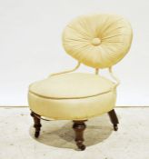 Unusual 19th century low chair with upholstered seat and back, on turned front legs to castors