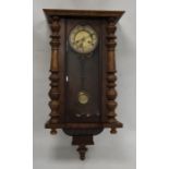 Walnut-cased Vienna-type regulator clock with Roman numerals to the dial