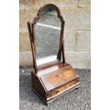 Early 18th century style walnut and banded dressing table mirror, the arched-top mirror on box