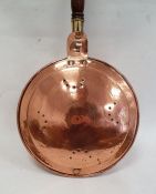 Copper bed warming pan with turned wooden handle