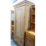 Vintage pine single-door wardrobe, the moulded cornice above the single door, single drawer under,
