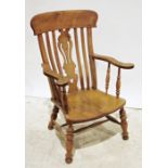 Elm-seated low armchair with carved and pierced shaped backsplat, on turned supports