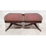 20th century mahogany extending twin-pedestal coffee table with D-shaped end supports, extending