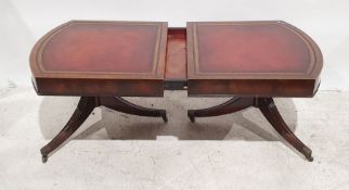 20th century mahogany extending twin-pedestal coffee table with D-shaped end supports, extending