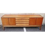 20th century modern teak sideboard in the Danish - style, with four central drawers flanked by