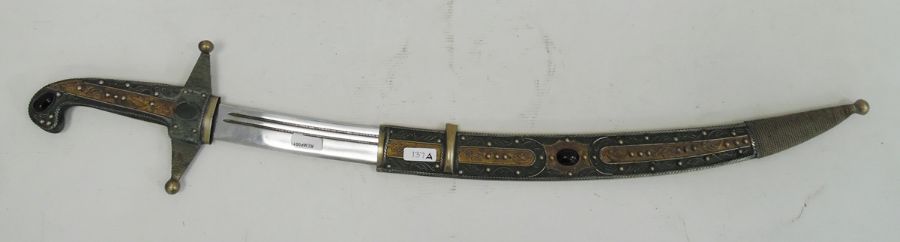 Eastern dagger with curved blade, the hilt, grip and sheath decorated with metal ropetwist and inset